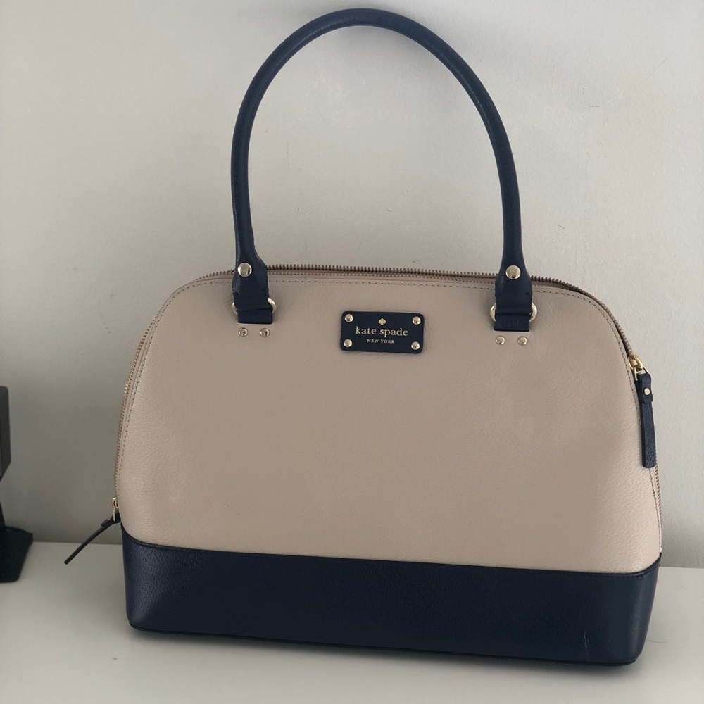 Classy Kate Spade bag! Can fit a 13-15 inch laptop